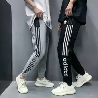 在飛比找Yahoo!奇摩拍賣優惠-現貨熱銷-Adidas 愛迪達長褲 夏季薄款 運動褲 情侶款