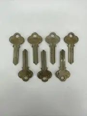LOT OF 7 Original Vintage P&F Corbin Ornate Brass Key Blanks