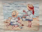Finished Cross Stitch - By The Sea “Collecting Shells”