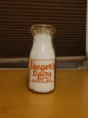 1/2 Pt Milk Bottle Seeger’s Dairy Inc Merrill WI Orange Pyro