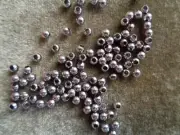 Gunmetal-plated brass bead, 3mm micro round. Sold per pkg of 100.