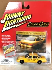 JOHNNY LIGHTNING "WHITE LIGHTNING" 1997 FORD CROWN VIC. TAXI CLASSIC GOLD