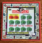 Monopoly Collector Card with Mr. Monopoly Man, board, and hats