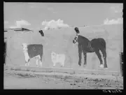 Photo:Native art on adobe wall. Amalia, New Mexico