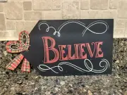 NEW PIER 1 ONE CHRISTMAS 12” X 6” METAL PRESENT TAG SIGN PLAID BOW BELIEVE