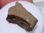 2.24 grams NWA 4777 Meteorite - class H4 - cut fragment - comes with a COA
