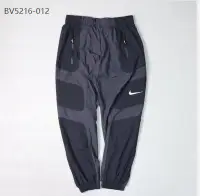 在飛比找Yahoo!奇摩拍賣優惠-正品 Nike 風褲 運動長褲 縮口褲 黑灰 男款 BV52