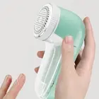 Effortless Fabric Hair Removal with the Compact Electric Clothing Shaver