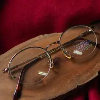 在飛比找PopChill優惠-[二手] 經典簡約金絲弧形線性半框式圓型鏡框 細框古董眼鏡J