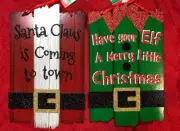2- Santa Claus Coming Town & Merry Little Christmas Wall Door Decor Sign 15”x9”