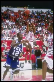 Guard Dominick Young Fresno State Bulldogs shoots the ball as team- Old Photo