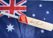 Aaron Finch (Australia) signed New Balance (Red/Orange) mini cricket bat + COA