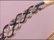 10kt Yellow Gold Womens Round Blue Color Enhanced Diamond Twist Bangle Brac