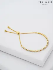 Ted Baker Gold Tone Isela Crystal Baguette Slinky Adjustable Bracelet (E76517) | $92