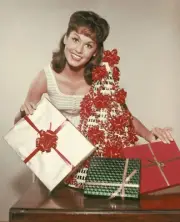 Mary Tyler Moore by Christmas presents in an early circa 1963 Old Photo