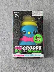 NeeDoh Squeeze Squish! Squishmas Groovy The Glowman Glows in the Dark Blue