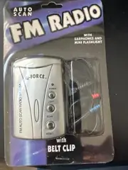 Vintage mini fm radio silver with ear buds and light