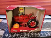 ERTL McCormick Farmall H w/ 1/64 Tractor 1/16 Diecast Farm Tractor Replica