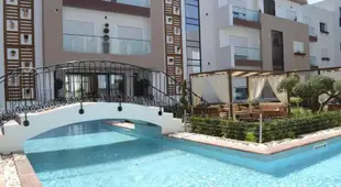 Appartement de haut standing dans residence recente avec piscines et reception