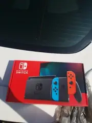Nintendo Switch w/ Neon Blue & Red Joy‑Con Grey 32GB (Newest Model)