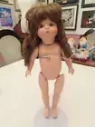 12 1/2" JOINTED BISQUE DOLL WITH DARK CURLY HAIR & BANGS - BLUE SIDE GLANCE EYES