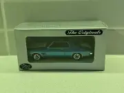 TRAX 1:43 TR18D HQ GTS MONARO COUPE BLUE With WHITE STRIPES