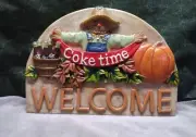 Coca Cola collectors scarecrow welcome sign