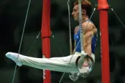 Yuri Chechi of Italy holds himself up in the ring competition duri- Old Photo