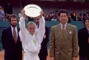 Anna Smashnova of Israel lifts the trophy after defeating Ines Gor- Old Photo