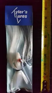 8 OZ. Parachute Lure Black and White Hair Silver and White Head