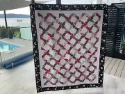 Handmade patchwork quilt. Jagged X’s (black white and red) #228