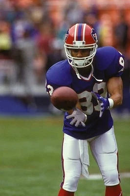 Andre Reed Buffalo Bills catches a pass during a NFL football game- Old Photo