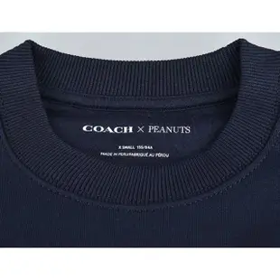 【COACH】COACH Peanuts Snoopy字母LOGO聯名款史努比抱糊塗塌客聖誕燈棉圓領長袖T恤(女款/海軍藍)