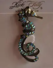KIRKS FOLLY SEA HORSE PIN IN ANTIQUE GOLD TONE