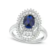 Oval Lab-Created Blue and White Sapphire Sunburst Frame Ring in Sterling Silver