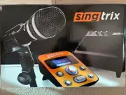 Karaoke System Singtrix w/speaker and microphone. In Original Box.
