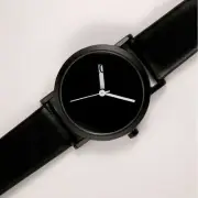 Minimalist Modern Steel Wrist Watch with a Cut-Out for Hour Display