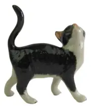 Miniature Ceramic Cat figurine, Black and White approx 6.5cm H x 6cm Long