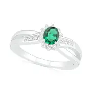 Oval Lab-Created Emerald and White Sapphire Starburst Frame Crossover Split Shank Ring in Sterling Silver