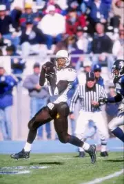 Wide receiver Wendell Montgomery Wyoming Cowboys catches the ball - Old Photo