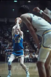 Bill Walton of the UCLA Bruins shoots a free throw during a game a- Old Photo