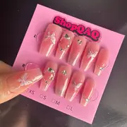 Here's a product description for your nail design: "2024 New Year Crystal Butterfly Nails - Sweetheart Girl, Gentle & Clear, White-Enhancing Handcrafted Press-On Nails with Cat Eye and Blush Accents"