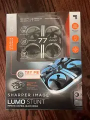 NIB SHARPER IMAGE LUMO STUNT Remote Control Glow Drone 115 Ft. 2.4 GHz