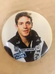 MARK ORCHARD NO 32 - COLLINGWOOD MAGPIES AFL TIN BADGE CIRCA 1990's