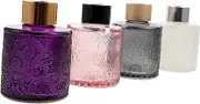 4Pcs Embossed Bottles Stylish Decorative Perfume Containers for Home Use for Essential Oils and Fragrance Diffusion Compact and Refillable Design