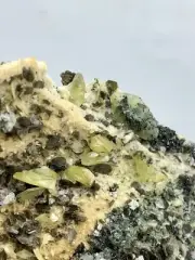 Titanite cluster with Calcite & Black Geothite on matrix