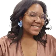 Whimsical iridescent blue beaded flower clip on earrings