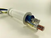 Wall Eye Ethernet Port 3/4" ID - Fits Thickness Variance of Between 3 7/8" - 5 3/8" This Unit Allows The Running of Wires, Tubes or Cables from one Side of a Barrier to The Other.