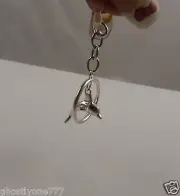 Dolphin going in hoop charm cell phone fits Ipad too charm ear cap dust plug