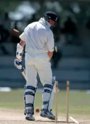Ashley Cowan of England is out bowled by Reon King for 13 run- Old Cricket Photo